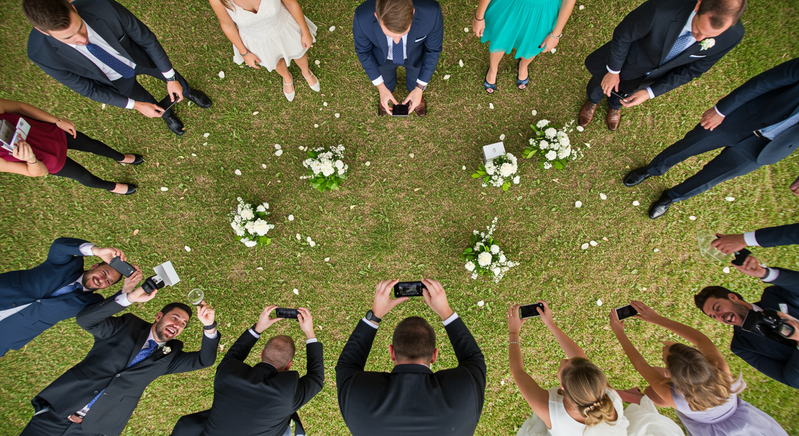 Creative wedding guest photography showing unique perspectives and angles